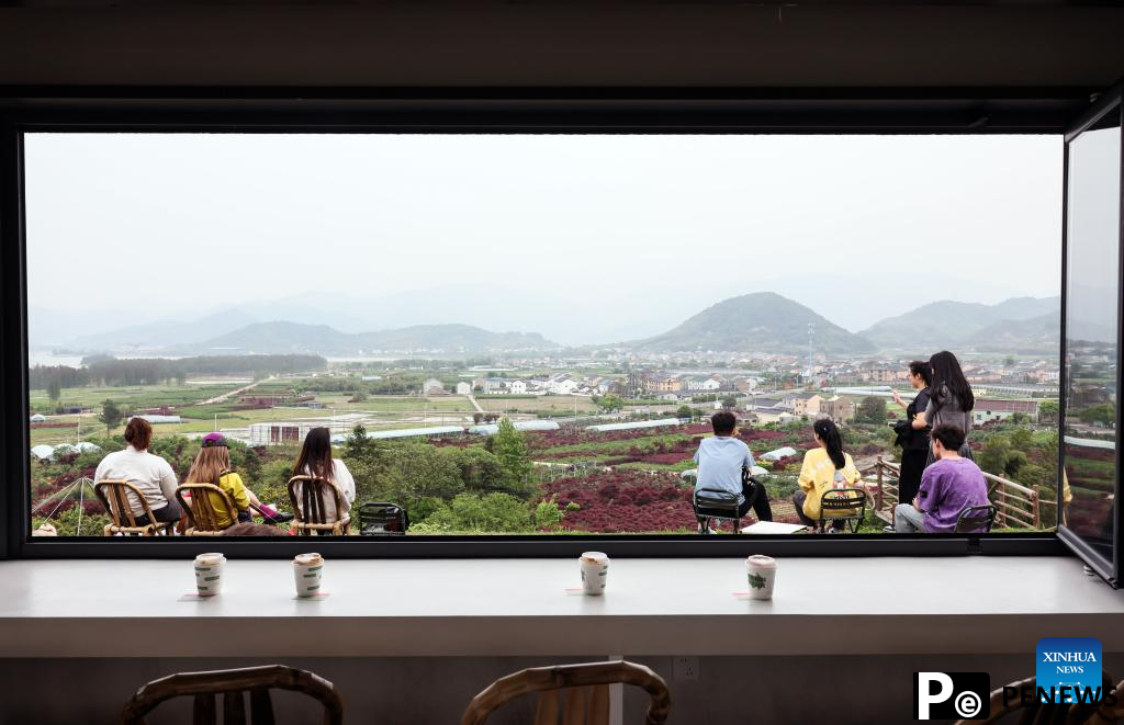 Young entrepreneur promotes high quality growth of agritourism in China