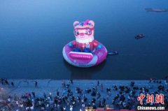 Gigantic mascots for 2025 Asian Winter Games make big debut splash on Songhua River in NE China's Heilongjiang