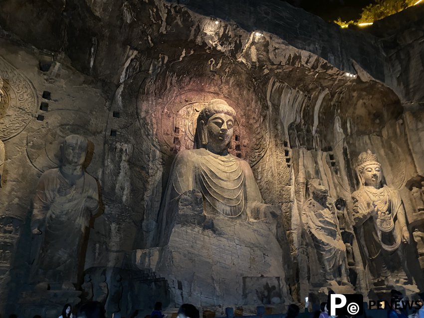 Embark on a mesmerizing night tour of Longmen Grottoes, C China