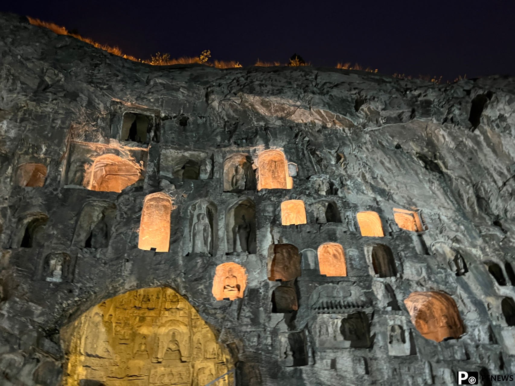 Embark on a mesmerizing night tour of Longmen Grottoes, C China