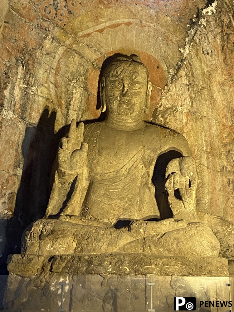 Embark on a mesmerizing night tour of Longmen Grottoes, C China