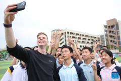 Athletes participate in pre-event school visit activity in Xiamen, China's Fujian