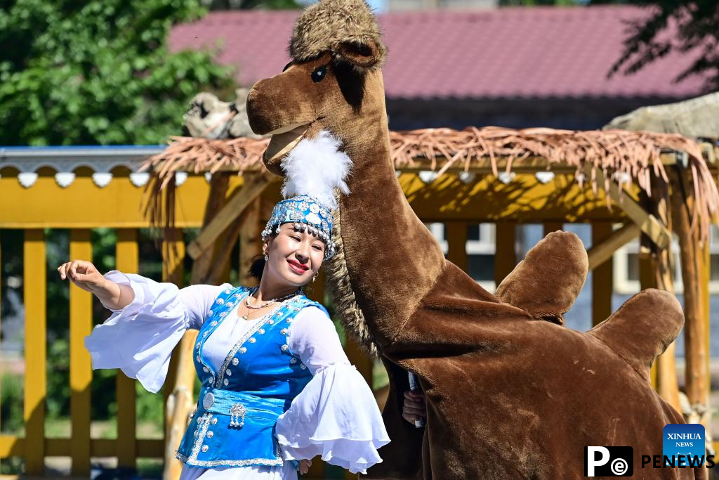 Xinjiang enters peak tourism season with various rural tour routes, cultural events
