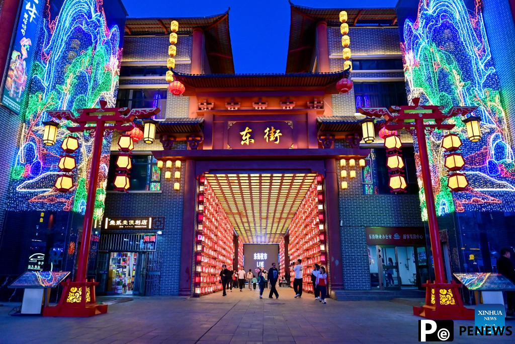 Xinjiang enters peak tourism season with various rural tour routes, cultural events