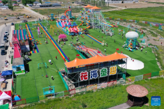 Xinjiang enters peak tourism season with various rural tour routes, cultural events