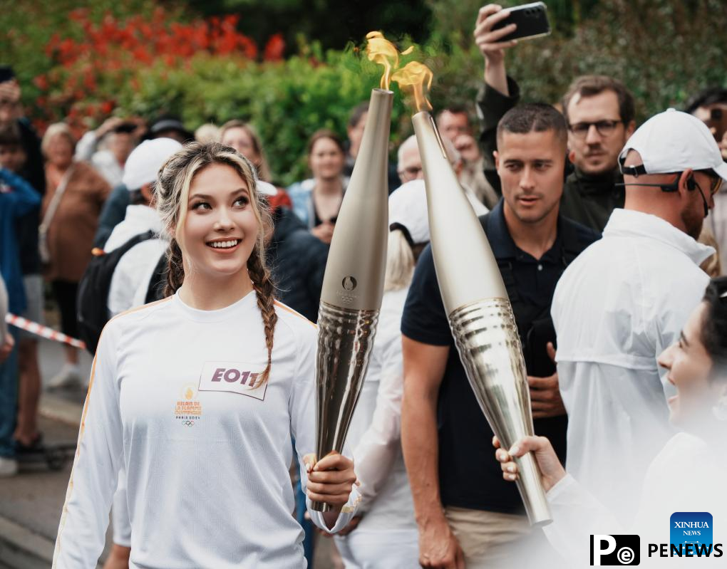 Winter Olympic champion Gu Ailing participates in Paris 2024 torch relay