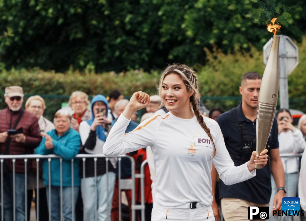 Winter Olympic champion Gu Ailing participates in Paris 2024 torch relay