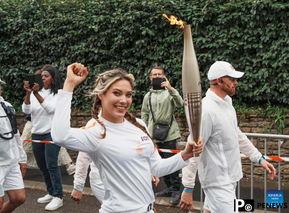 Winter Olympic champion Gu Ailing participates in Paris 2024 torch relay