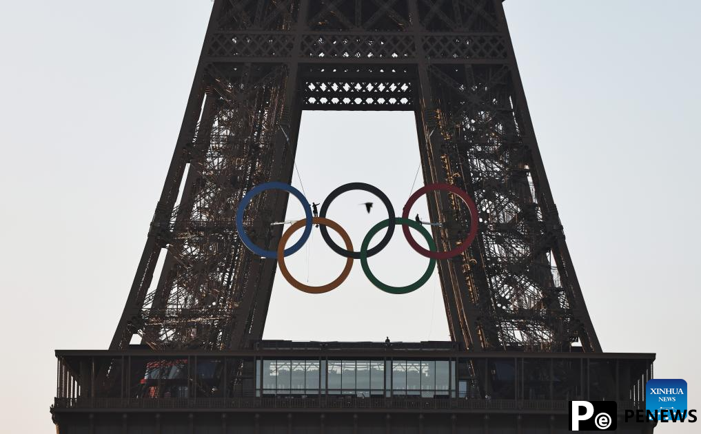 Olympic rings seen on Eiffel Tower in Paris