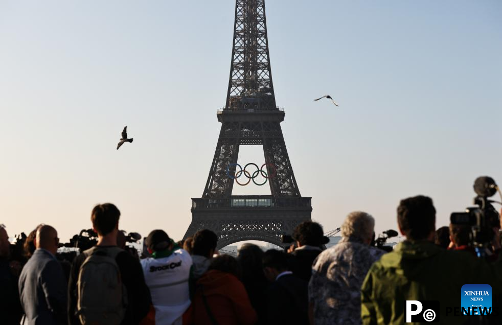 Olympic rings seen on Eiffel Tower in Paris