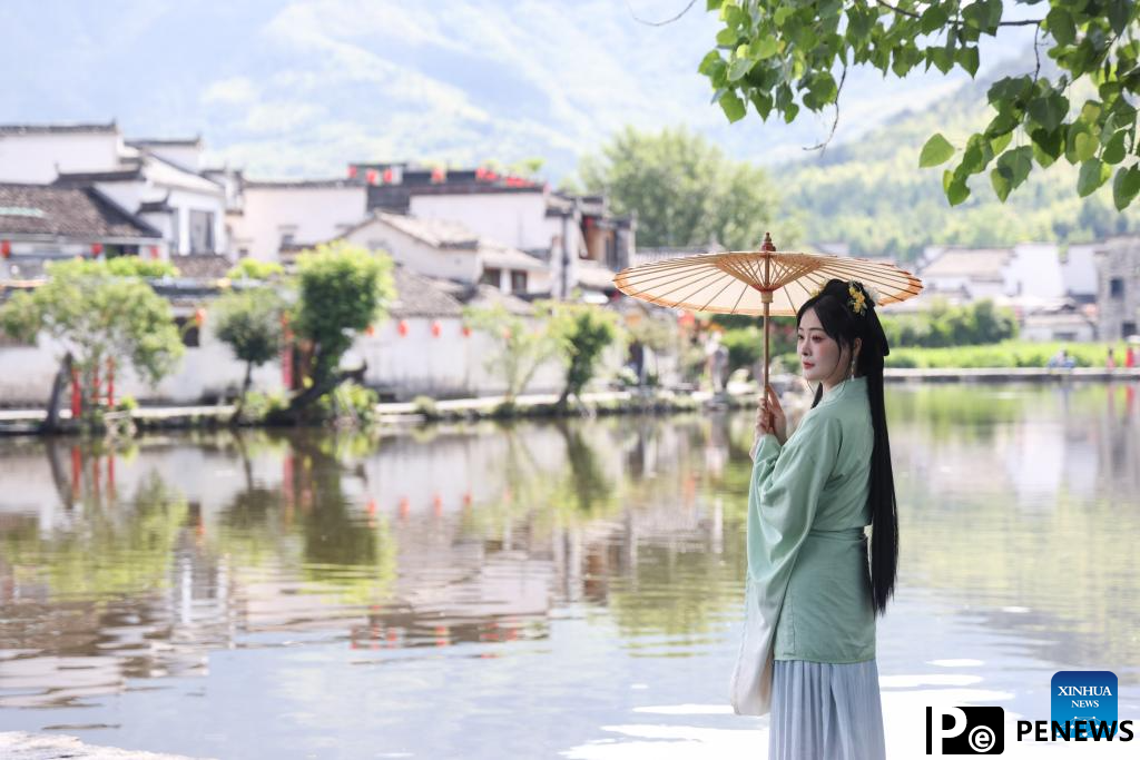 Tourists visit Hongcun Village in county of Anhui, E China
