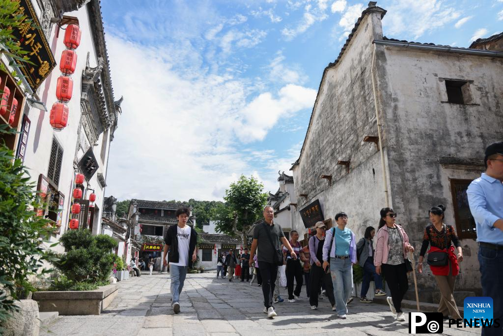 Tourists visit Hongcun Village in county of Anhui, E China