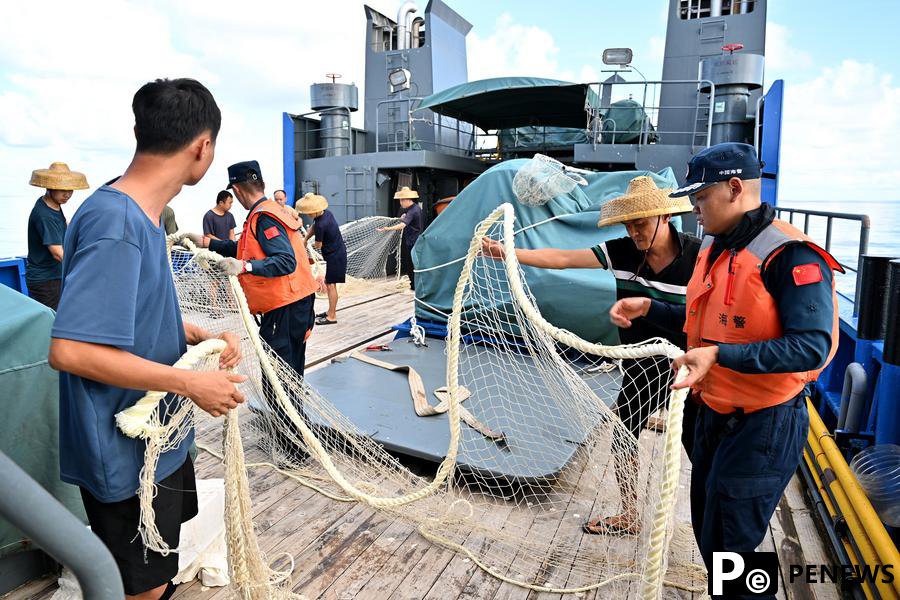 InPics: China Coast Guard retrieve illegally obtained fishing nets by Filipinos in China