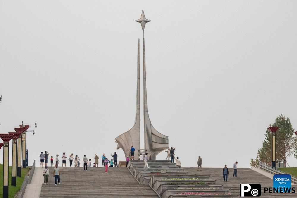 Tourists enjoy leisure time in Mohe, NE China