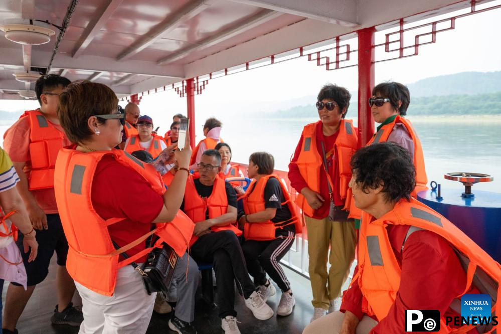 Tourists enjoy leisure time in Mohe, NE China
