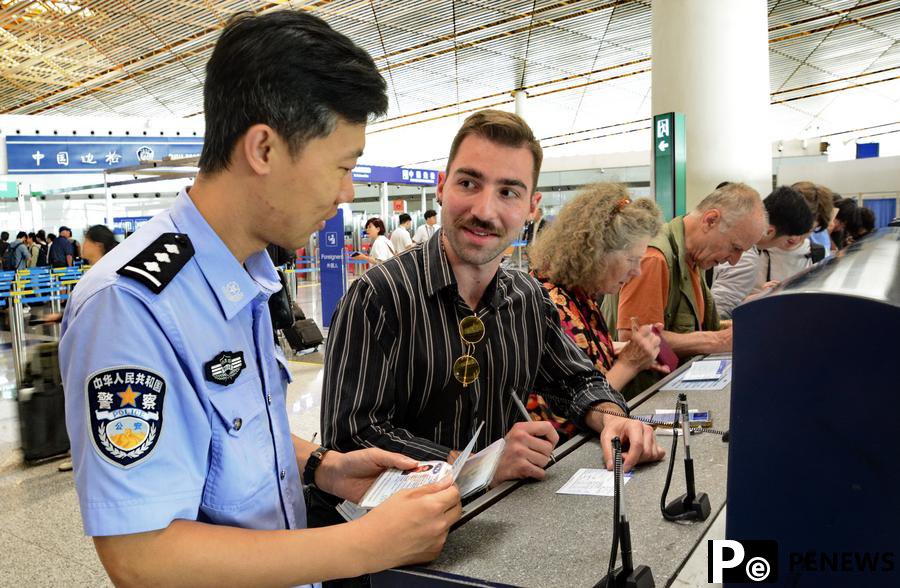 China sees surge of foreign travelers following transit visa-free policies