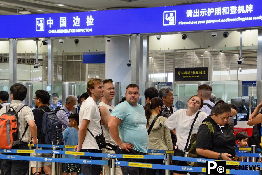 China sees surge of foreign travelers following transit visa-free policies