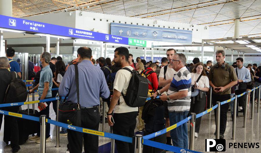 China sees surge of foreign travelers following transit visa-free policies