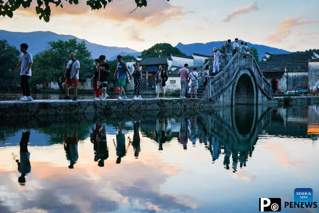 Sunset view of Hongcun Village in Yixian County, E China