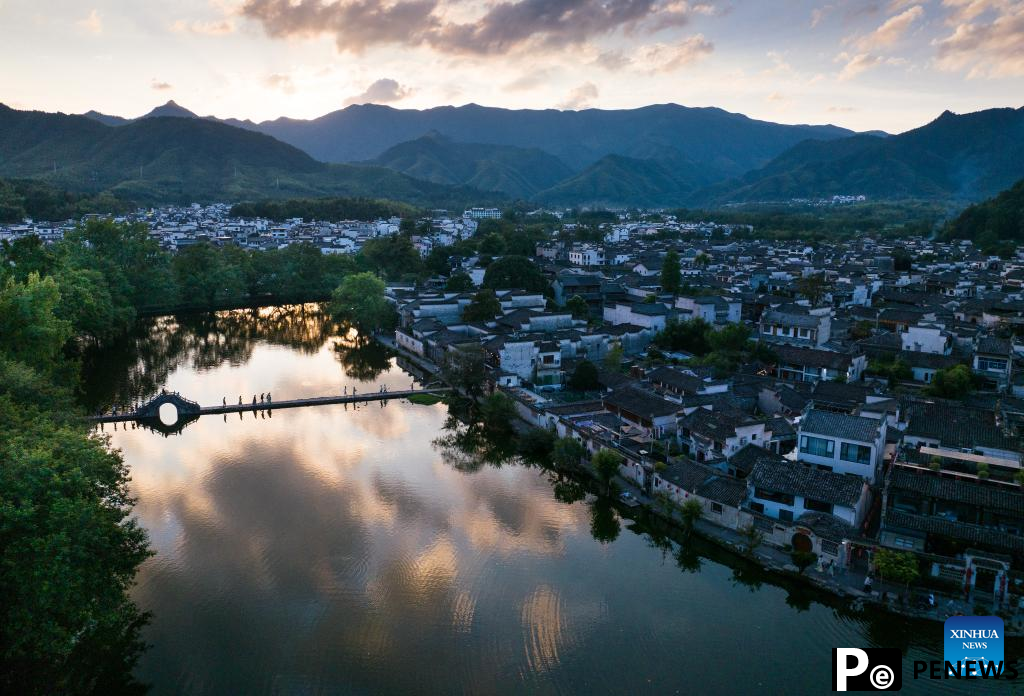 Sunset view of Hongcun Village in Yixian County, E China