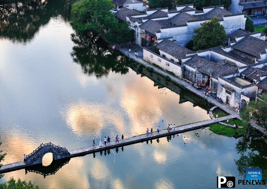 Sunset view of Hongcun Village in Yixian County, E China