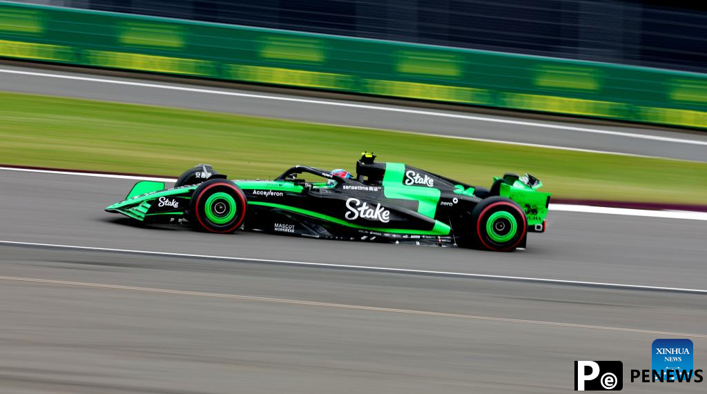 Chinese driver Zhou Guanyu competes during F1 British GP