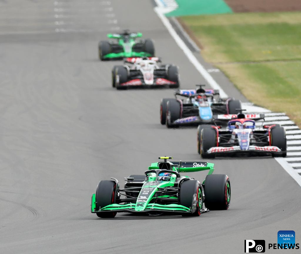 Chinese driver Zhou Guanyu competes during F1 British GP