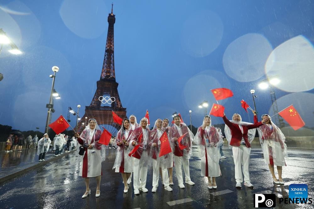 Paris Olympics opens with historic ceremony on River Seine