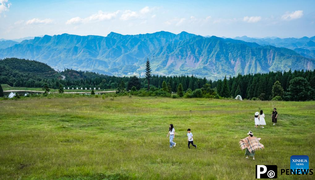 Haiping Yi ethnic cultural township sees summer tourism surge