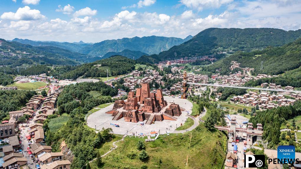 Haiping Yi ethnic cultural township sees summer tourism surge