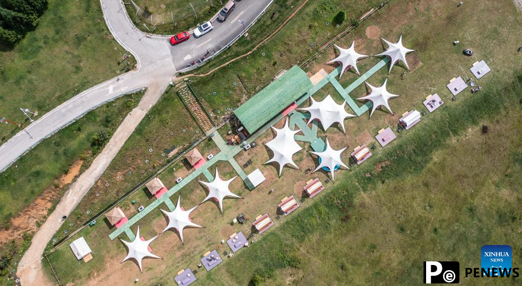 Haiping Yi ethnic cultural township sees summer tourism surge