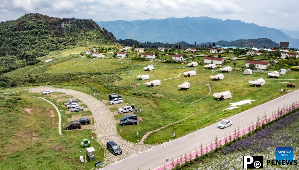 Haiping Yi ethnic cultural township sees summer tourism surge