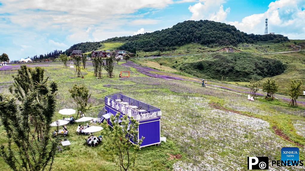 Haiping Yi ethnic cultural township sees summer tourism surge