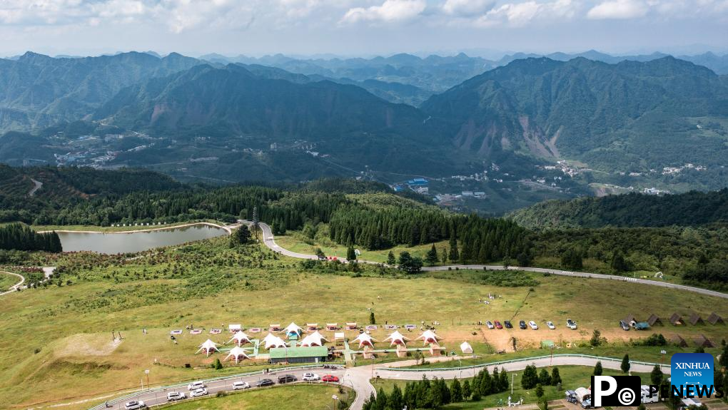 Haiping Yi ethnic cultural township sees summer tourism surge