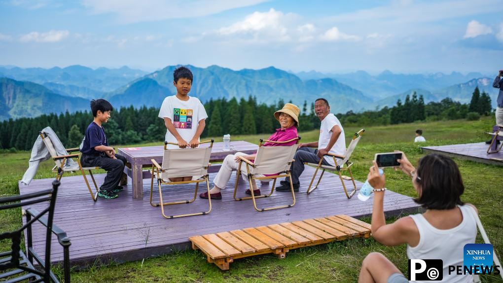 Haiping Yi ethnic cultural township sees summer tourism surge