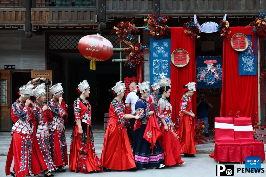 Local authorities in SW China leverage ethnic features to boost summer tourism