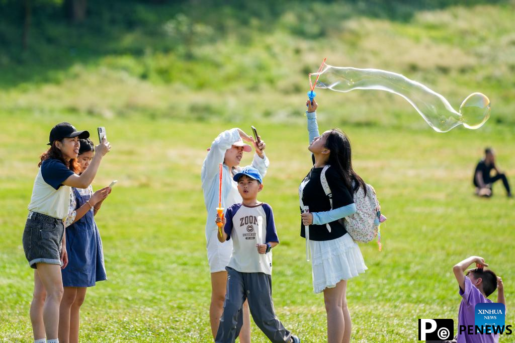 Tourists visit Fairy Mountain scenic area in Chongqing, SW China