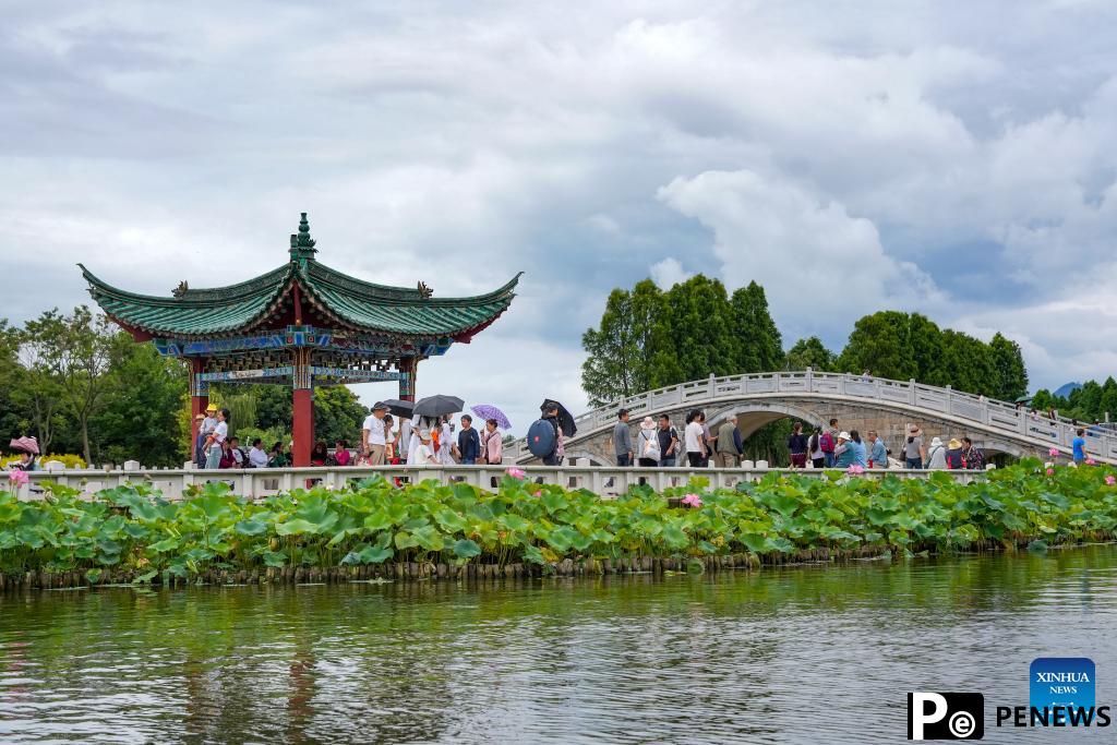 Tourist destinations across China see surge in visitors during peak summer tourist season