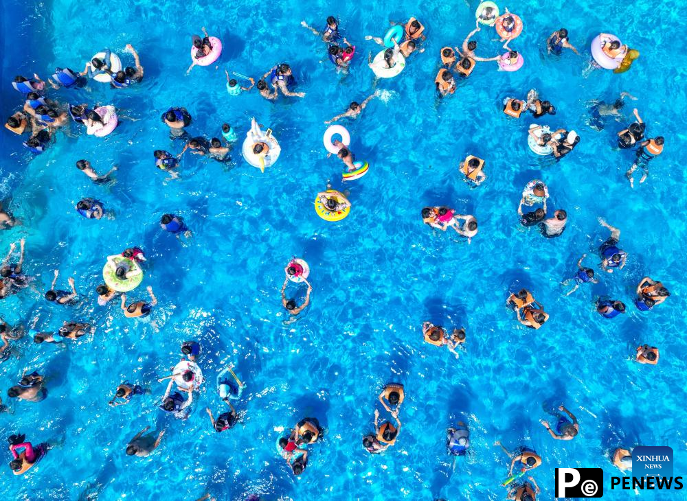 Tourist destinations across China see surge in visitors during peak summer tourist season
