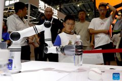 China showcases AI prowess at 2024 WAIC, with 24 AI projects signed