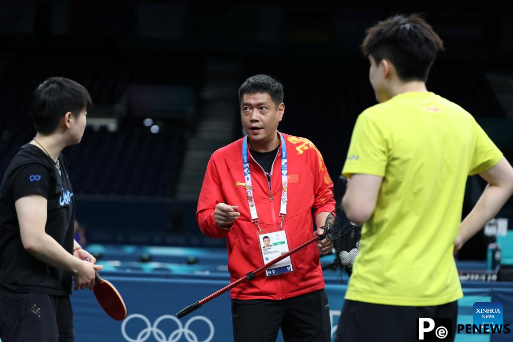 Chinese national table tennis team attends training session ahead of Paris 2024