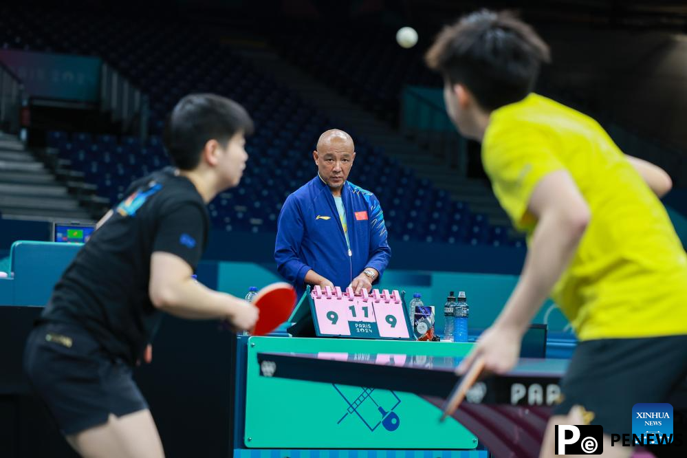 Chinese national table tennis team attends training session ahead of Paris 2024