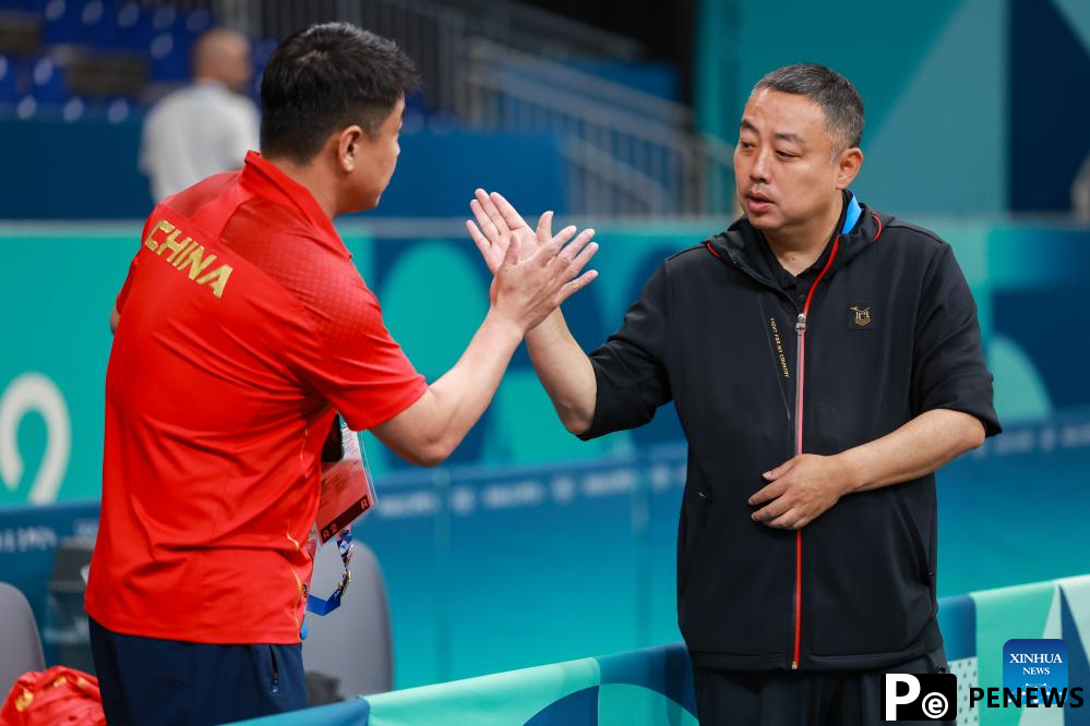 Chinese national table tennis team attends training session ahead of Paris 2024