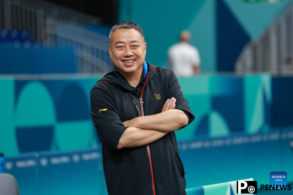 Chinese national table tennis team attends training session ahead of Paris 2024