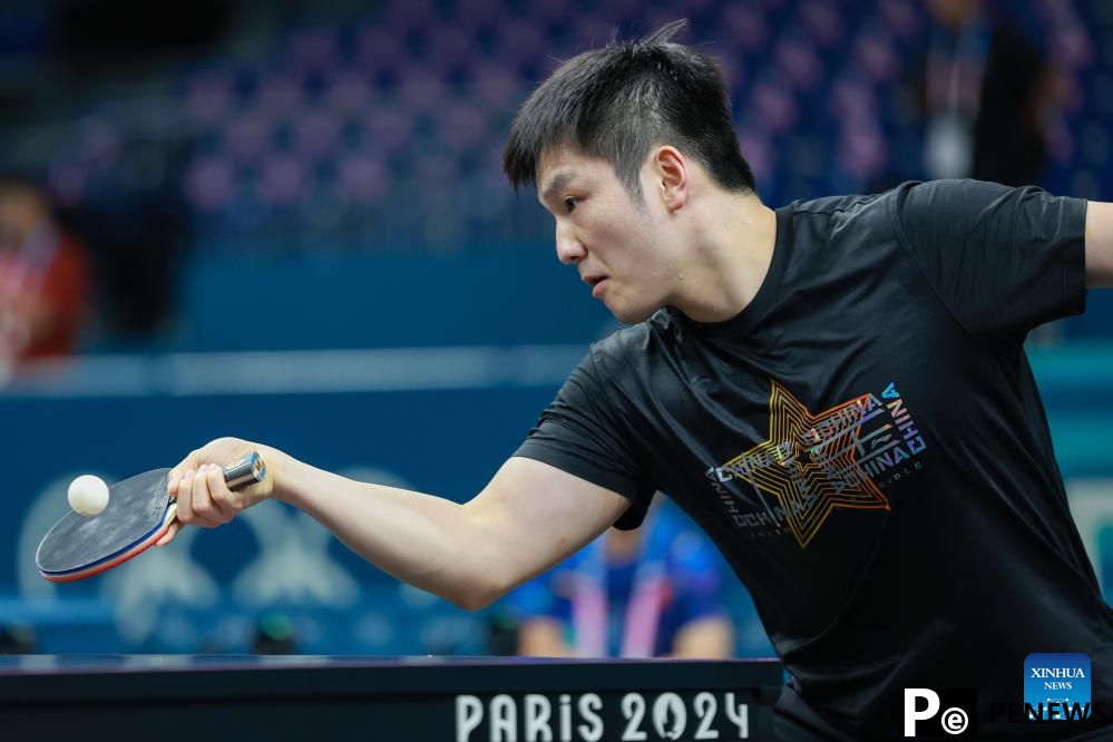 Chinese national table tennis team attends training session ahead of Paris 2024