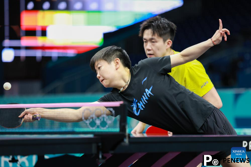 Chinese national table tennis team attends training session ahead of Paris 2024