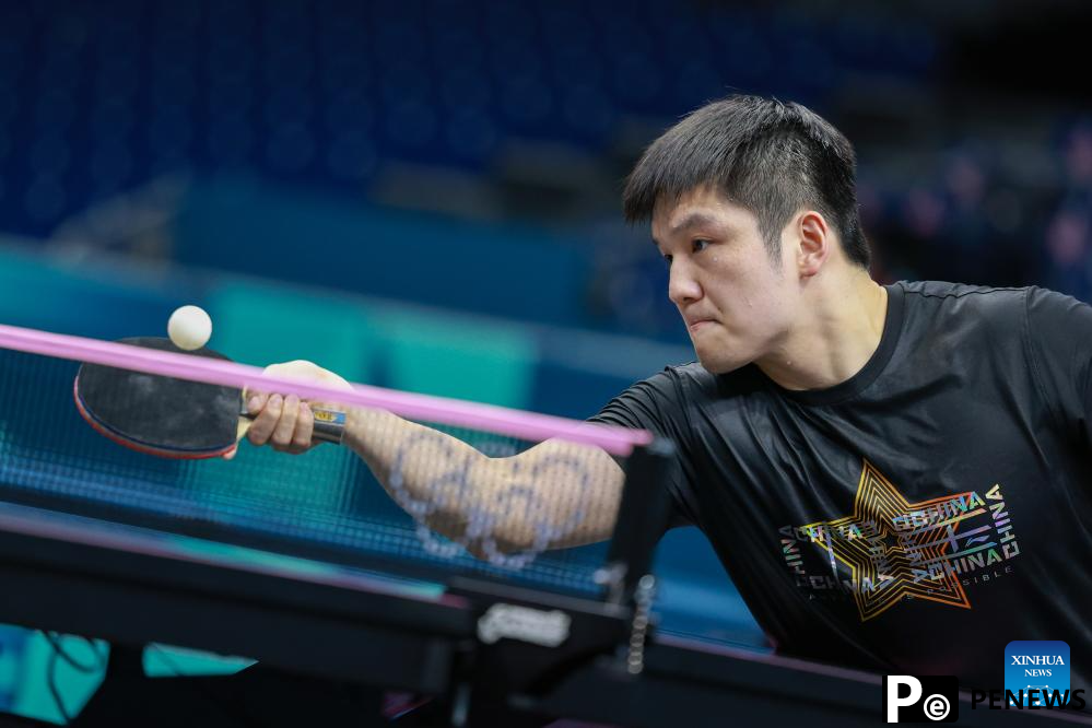 Chinese national table tennis team attends training session ahead of Paris 2024