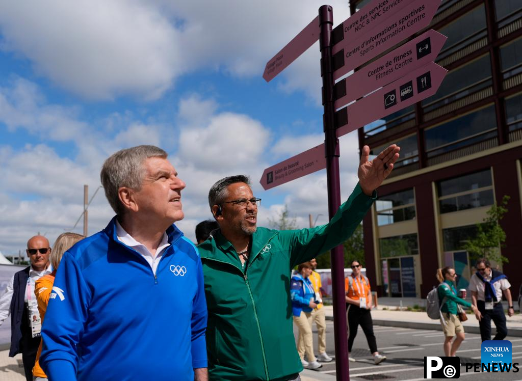 IOC chief Bach tours Olympic Village ahead of Paris 2024
