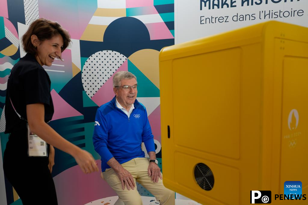 IOC chief Bach tours Olympic Village ahead of Paris 2024