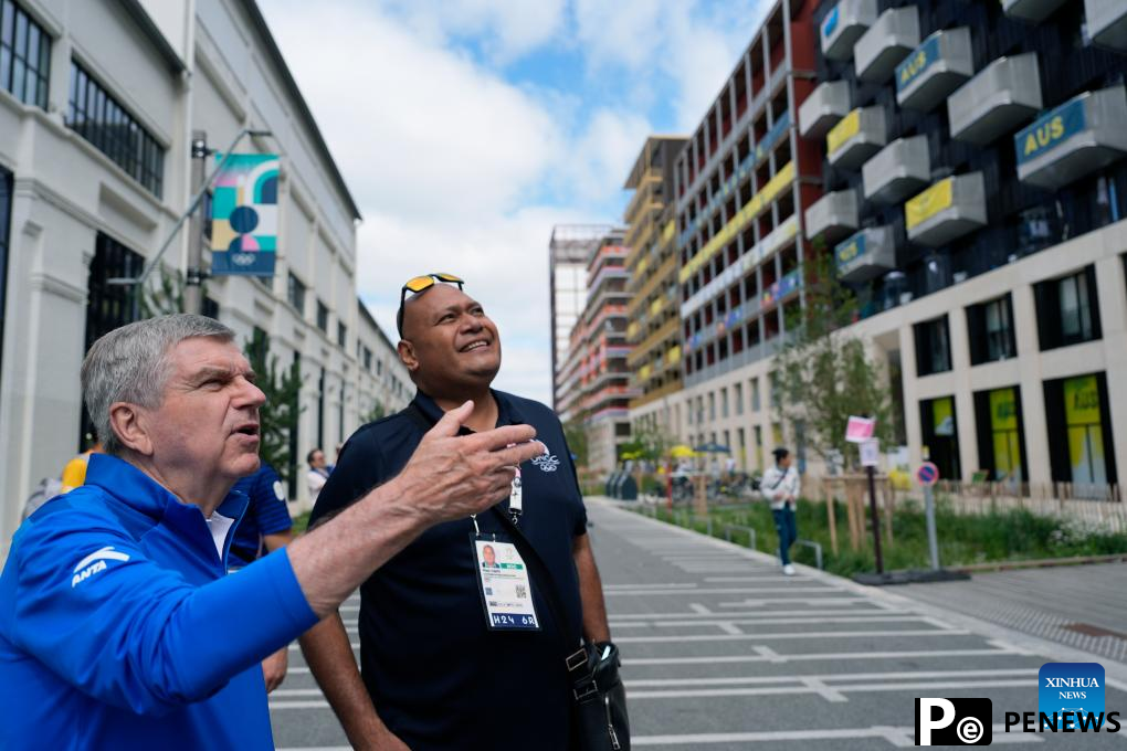 IOC chief Bach tours Olympic Village ahead of Paris 2024